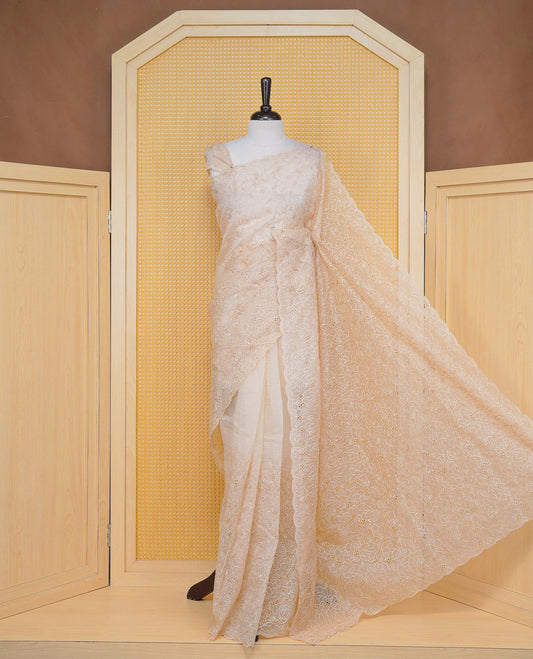 Cream colour Crush organza saree with Thread work.