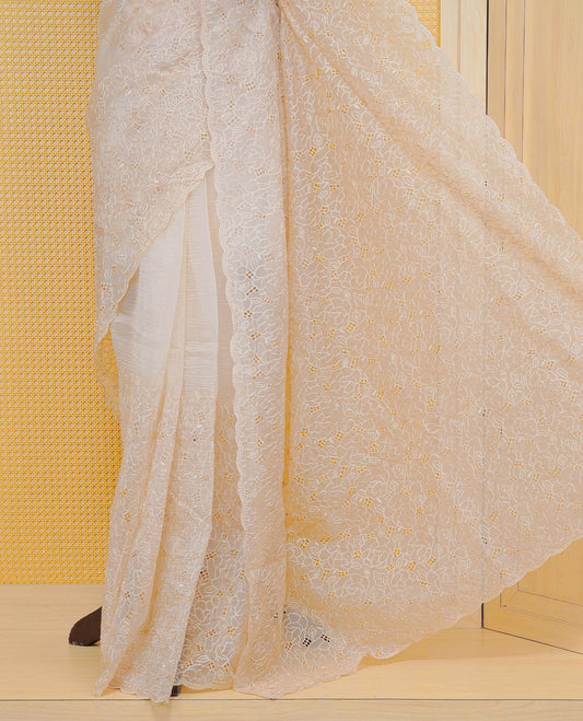 Cream colour Crush organza saree with Thread work.