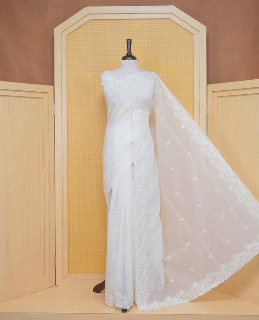 White colour Crush organza saree with Thread & Cut beat work.