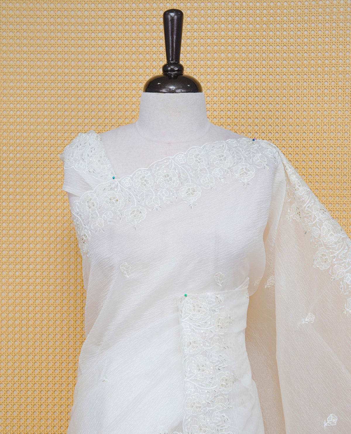 White colour Crush organza saree with Thread & Cut beat work.