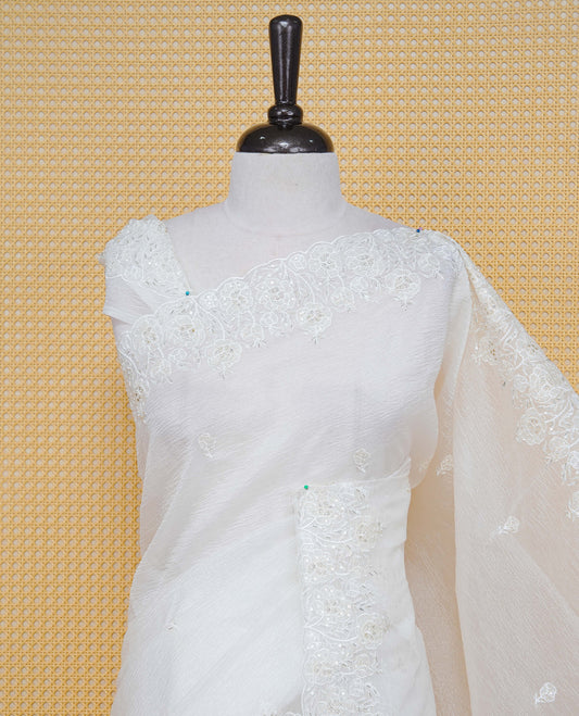 White colour Crush organza saree with Thread & Cut beat work.