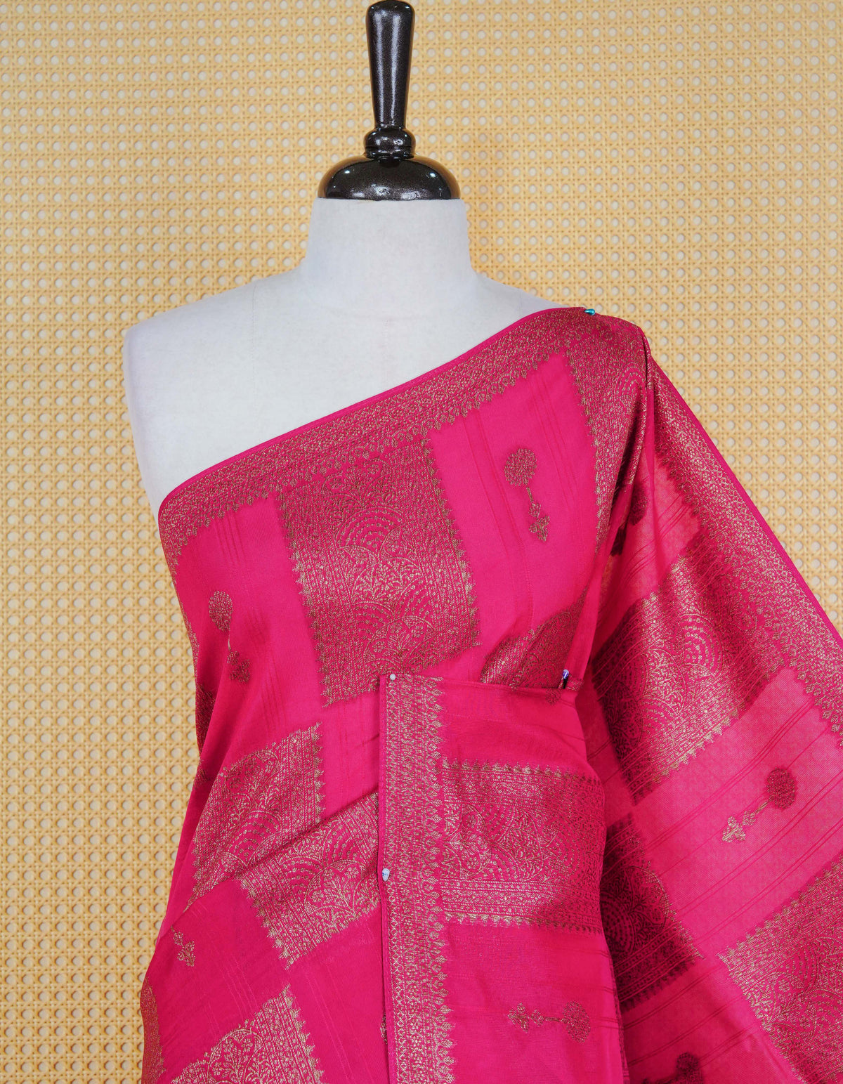 Pink colour semi banaras tussar georgette saree featuring gold zari box pattern with motifs on body, finished with gold zari fancy border and paired with matching blouse piece.