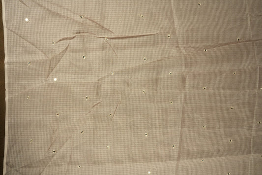 Beige colour Doriya check cotton saree with soft sequins work on the body, elegant embroidery scallop border, and a simple pallu & Comes with a matching plain blouse piece.