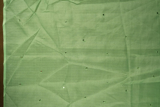 Green colour Doriya check cotton saree with soft sequins work on the body, elegant embroidery scallop border, and a simple pallu & Comes with a matching plain blouse piece.