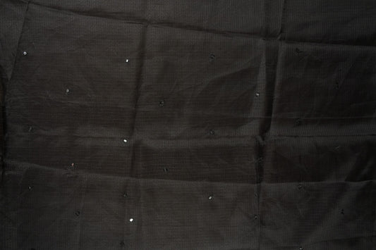 Black colour Doriya check cotton saree with soft sequins work on the body, elegant embroidery scallop border, and a simple pallu & Comes with a matching plain blouse piece.