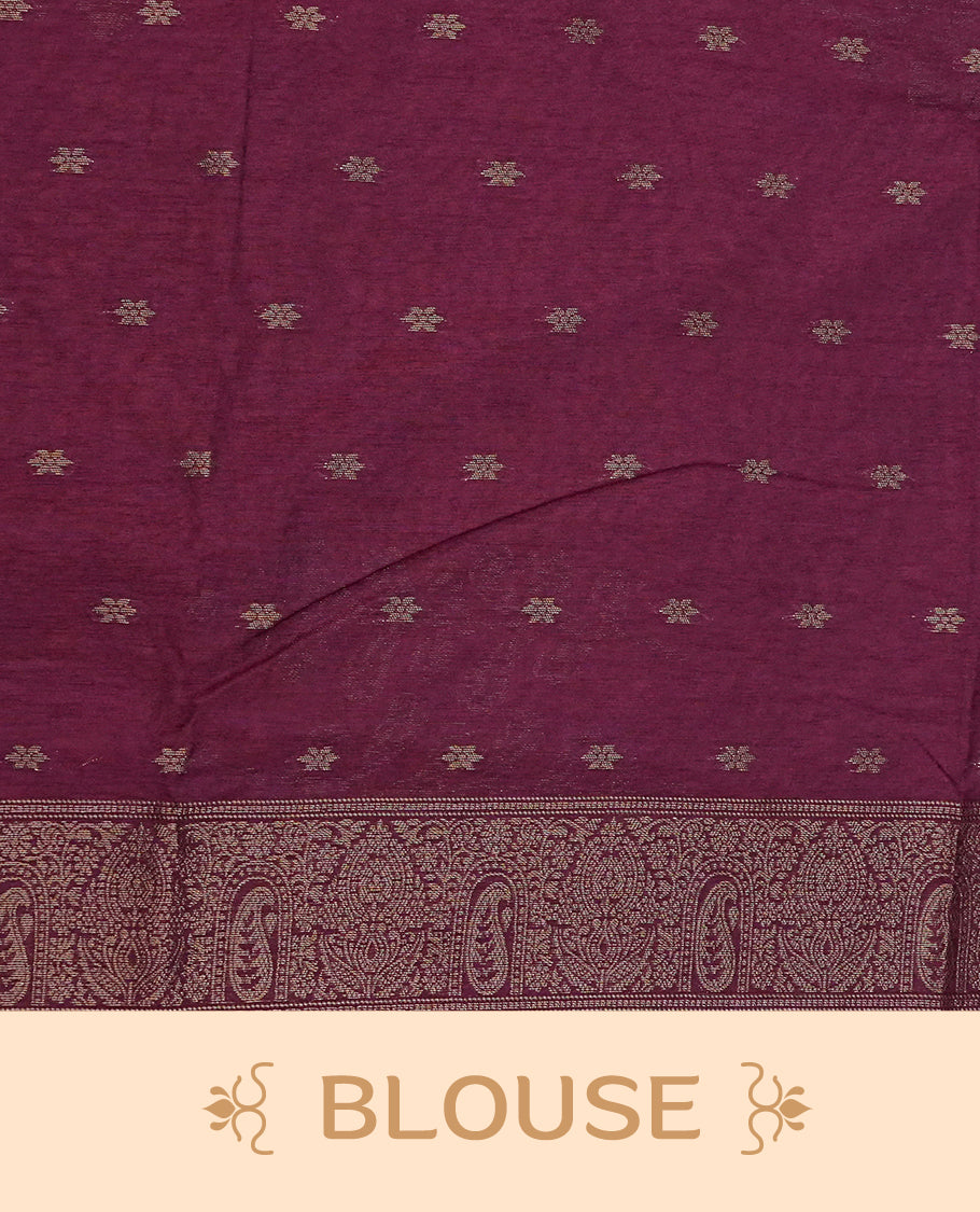 Rust orange colour semi linen saree with elegant gold zari leaf motifs across the body, complemented by a rich wine purple contrast pallu with intricate gold zari  works and a borderless design, paired with a matching blouse piece.