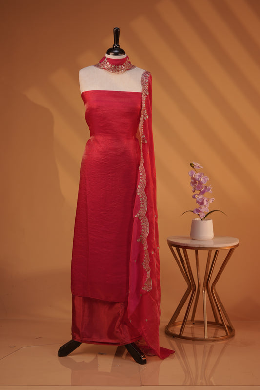 Rani Pink colour Fendy silk salwar material With Elegant plain body with lining, Comes with santoon bottom, Fendy silk dupatta With Floral buttas & Scalp Border.