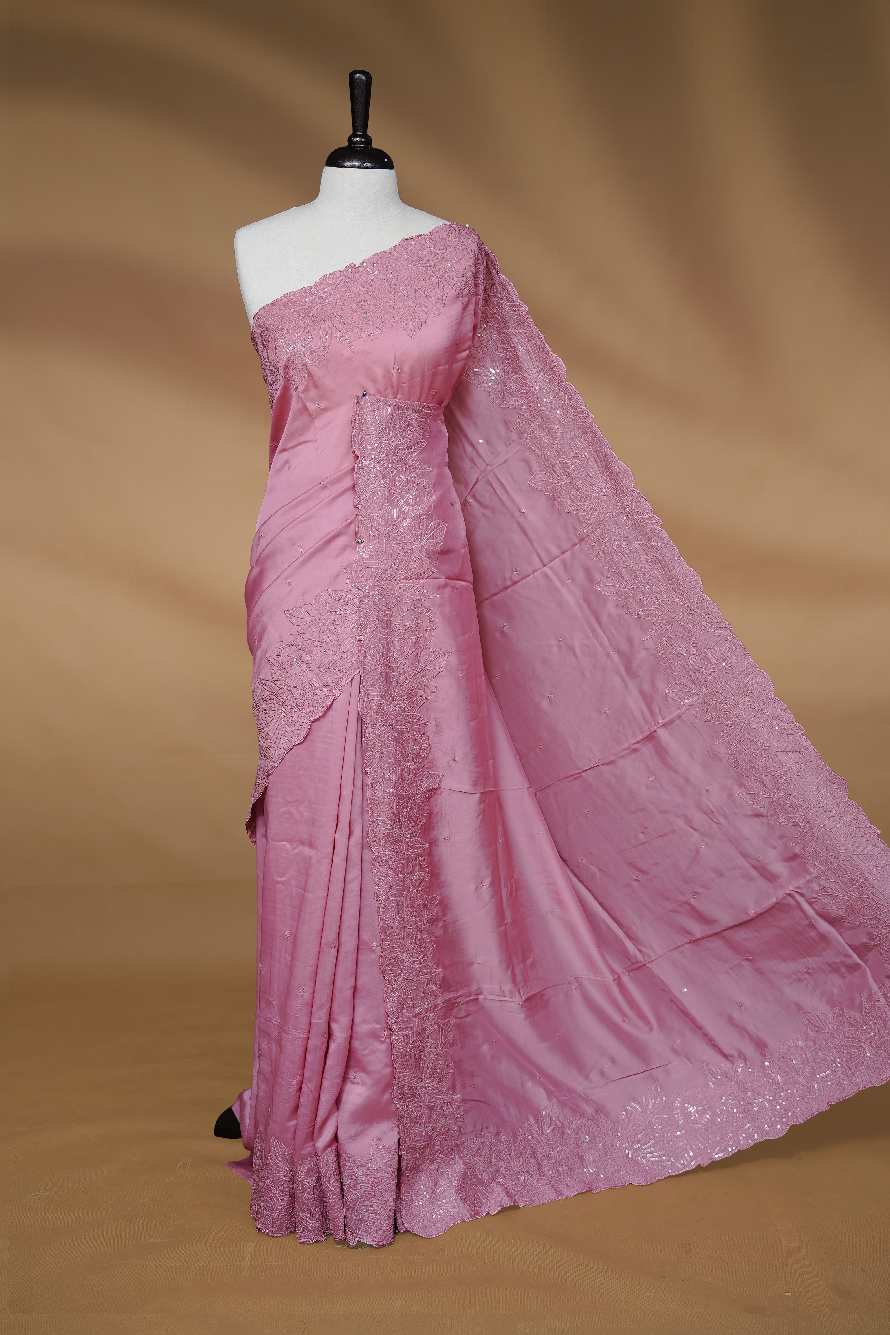 Pastel Pink colour Designer saree featuring Elegant Thread & sequins on body, complemented self colour thread & Sequins scalp border, paired with matching blouse piece.