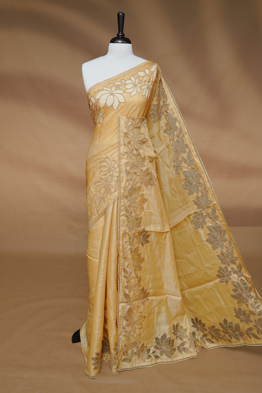 Pastel Yellow colour Designer saree Featuring Elegant plain body, enhance with thread Lotus Pattern with lace border, paired with matching blouse piece.