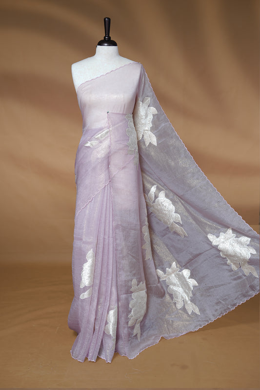 Pastel purple colour Crush Organza Saree featuring White floral Pattern on body, complemented by classy Thread border, paired with matching blouse piece.