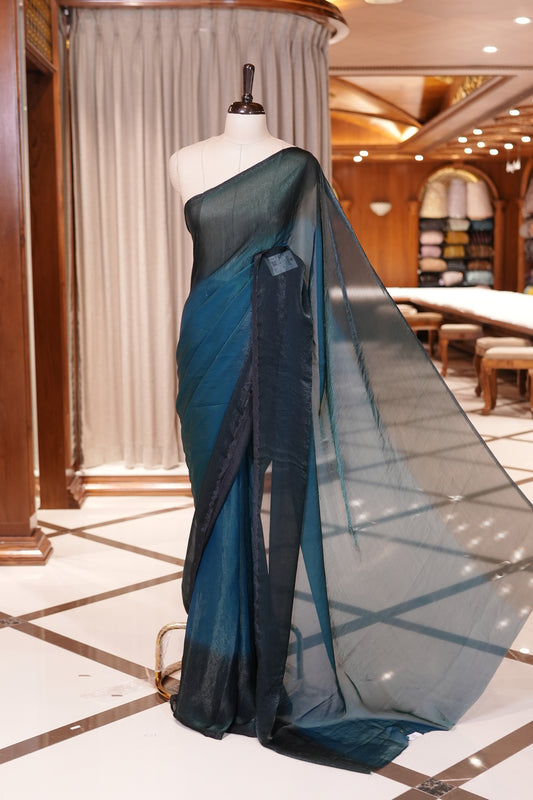 Peacock Green Colour Soft Shine Fendy Chiffon Saree, with plain body with contrast border, without blouse.