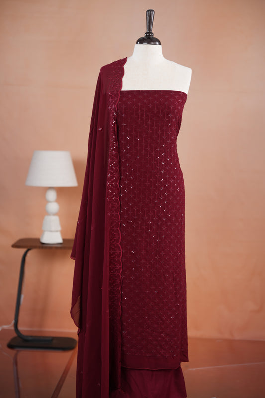 Maroon colour georgette salwar set  featuring Sequence worked body & border, comes with santoon bottom , paired with same material dupatta with same sequence work.