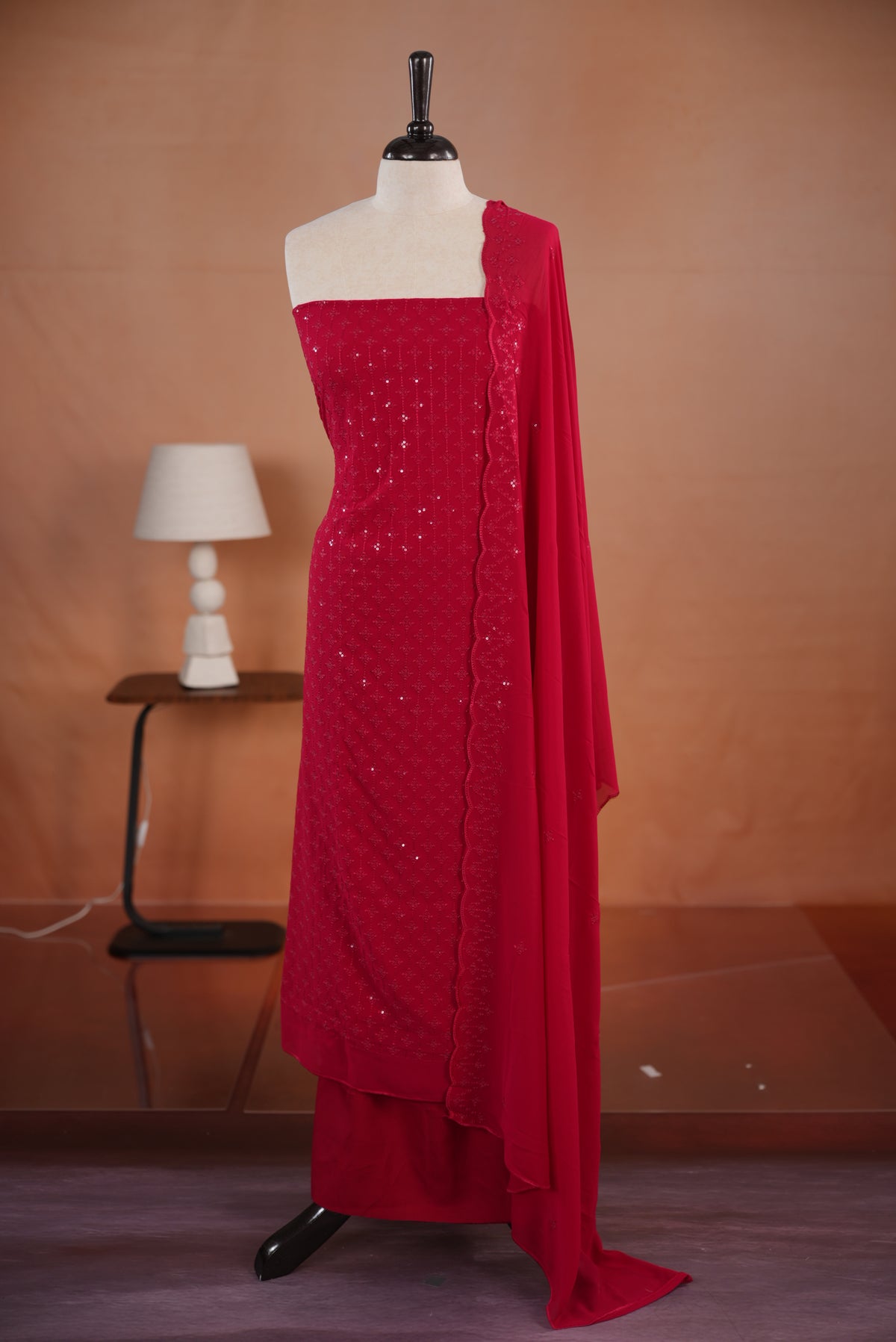 Rani pink colour georgette salwar set  featuring Sequence worked body & border, comes with santoon bottom , paired with same material dupatta with same sequence work.