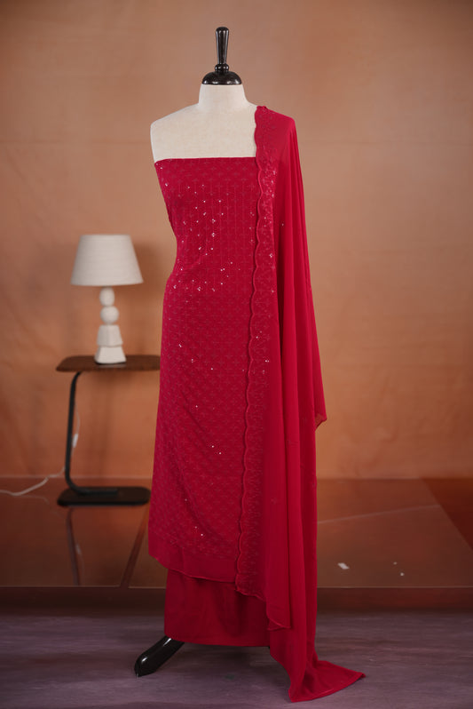Rani pink colour georgette salwar set  featuring Sequence worked body & border, comes with santoon bottom , paired with same material dupatta with same sequence work.