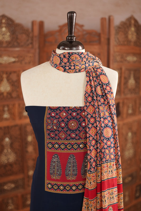 Navy Blue colour georgette salwar material featuring Daman Print Detailing Mirror work on neck portion, a dupatta with Same print , and Shantoon bottom.