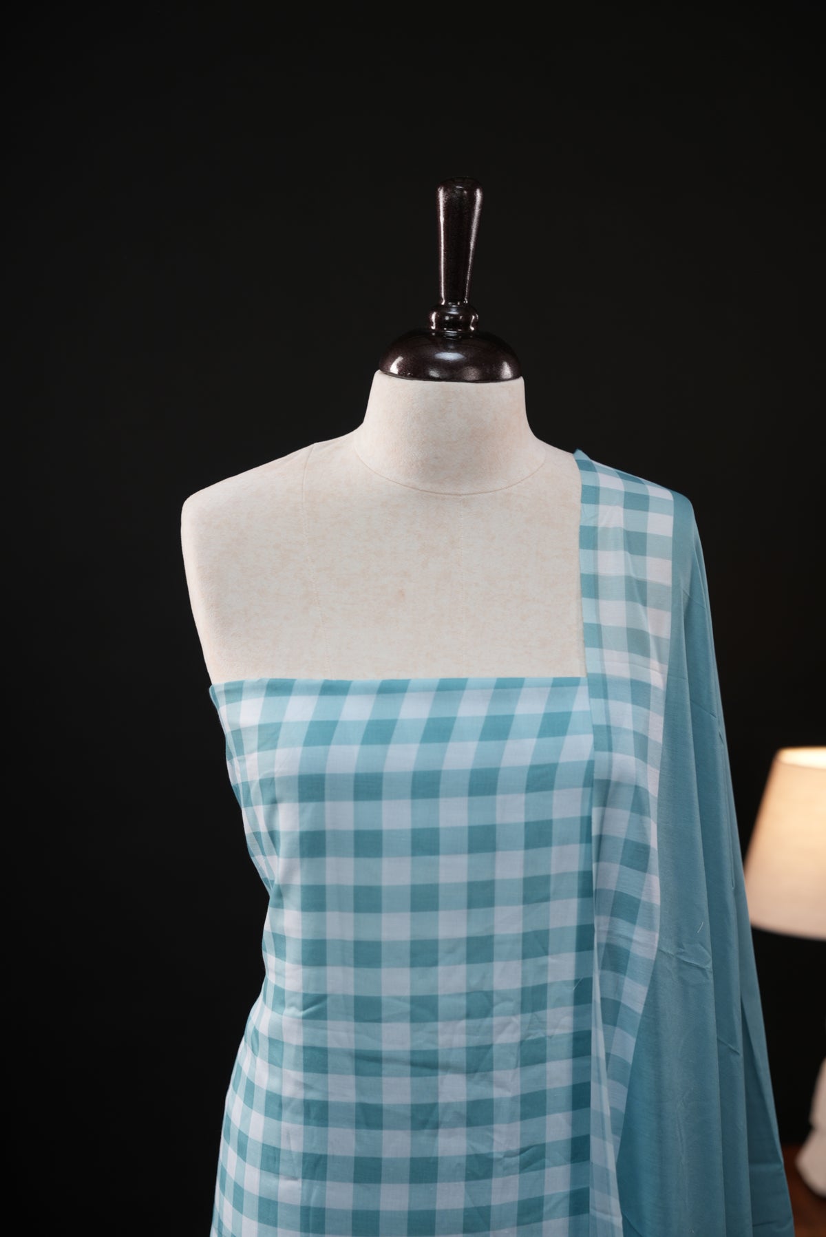 Teal Blue colour checked Mul Chanderi salwar material, paired with a matching bottom and dupatta.