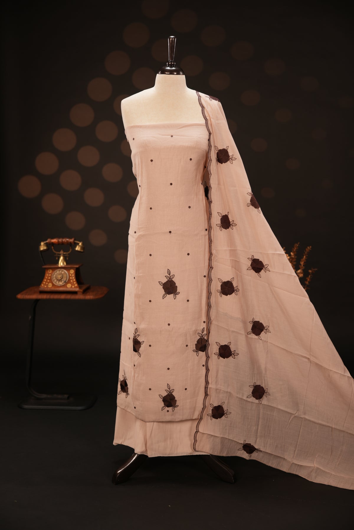 Beige colour mul chanderi salwar material featuring Floral & dot Thread embroidery body and border, paired with Same design with scallop border dupatta and santoon material bottom