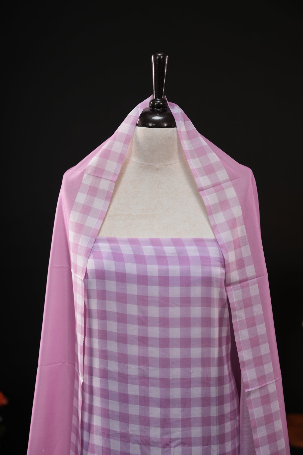 Purple colour checked Mul Chanderi salwar material, paired with a matching bottom and dupatta.