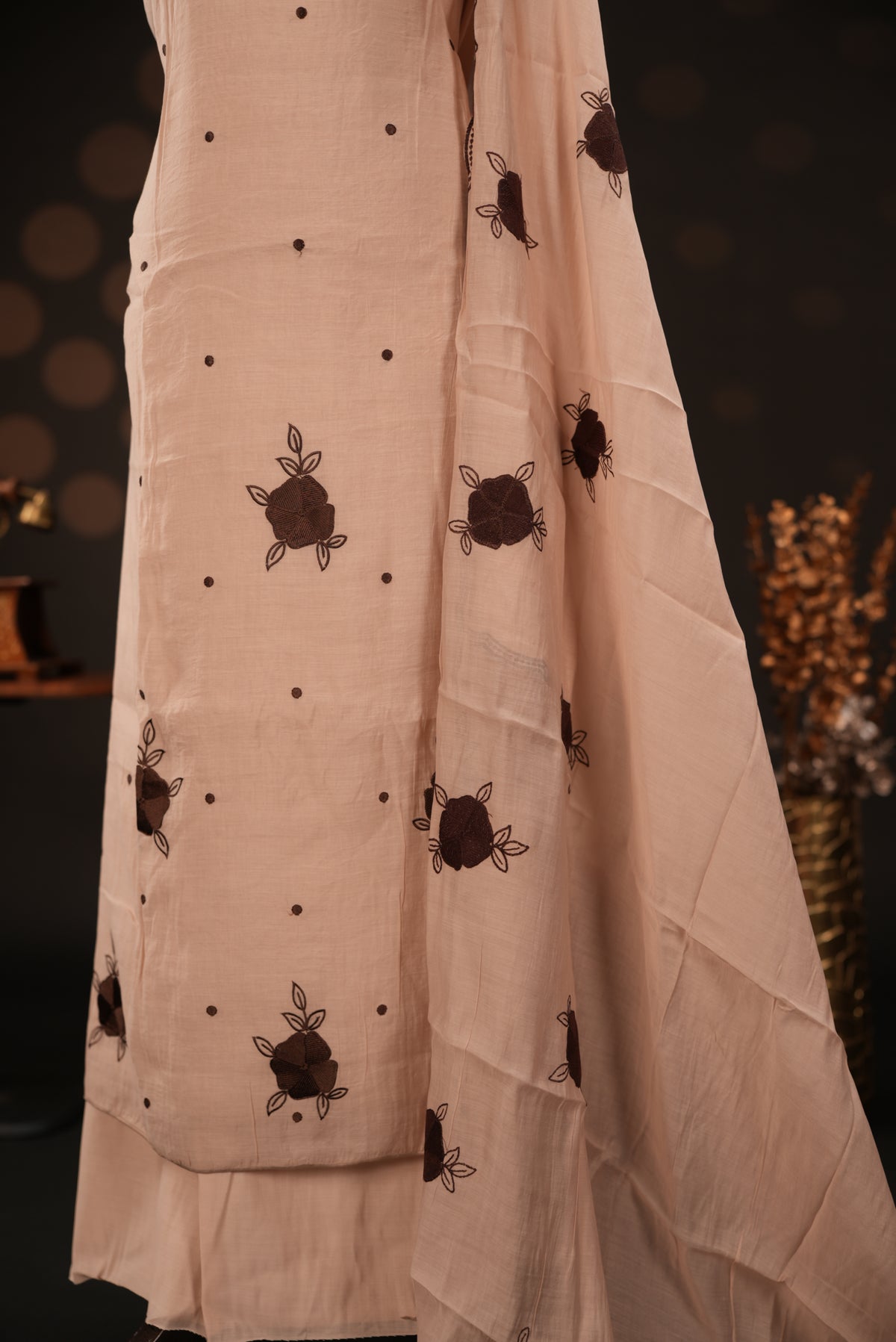 Beige colour mul chanderi salwar material featuring Floral & dot Thread embroidery body and border, paired with Same design with scallop border dupatta and santoon material bottom
