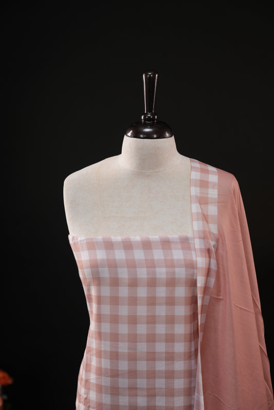 Rust Orange colour checked Mul Chanderi salwar material, paired with a matching bottom and dupatta.