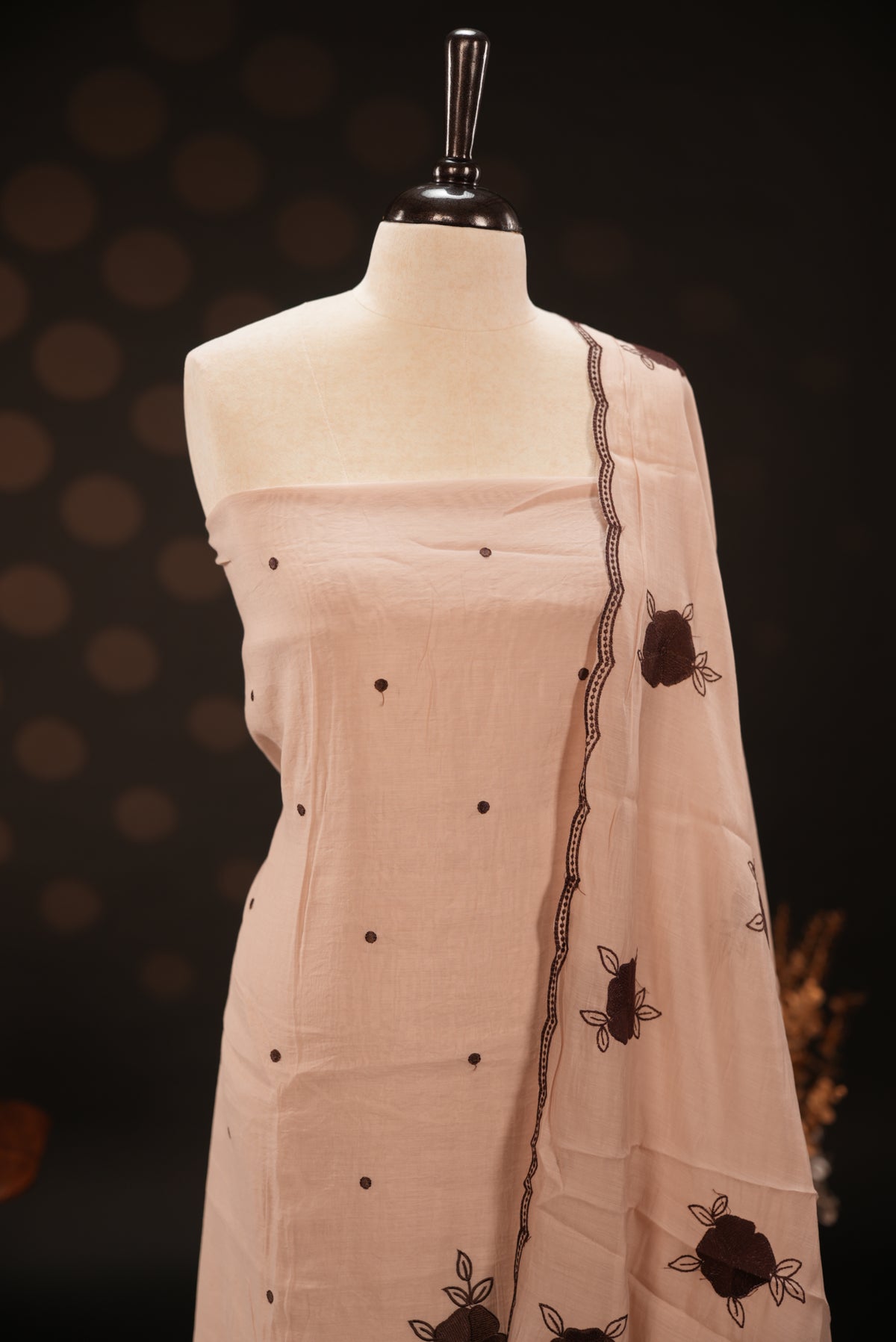 Beige colour mul chanderi salwar material featuring Floral & dot Thread embroidery body and border, paired with Same design with scallop border dupatta and santoon material bottom