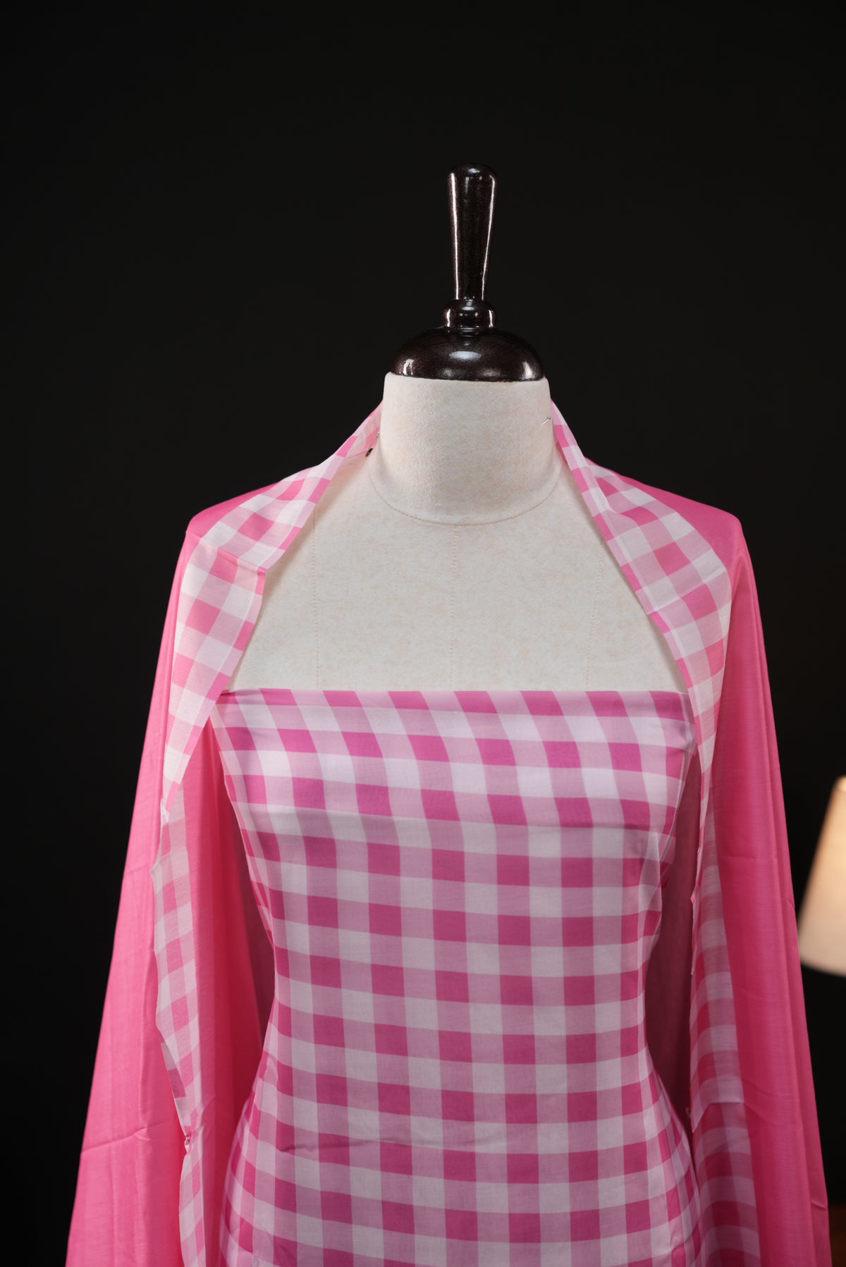 Pink colour checked Mul Chanderi salwar material, paired with a matching bottom and dupatta.