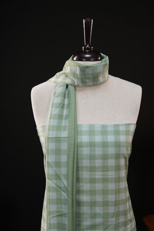 Green colour checked Mul Chanderi salwar material, paired with a matching bottom and dupatta.