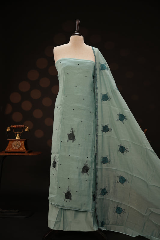 Pastel ice blue colour mul chanderi salwar material featuring Floral & dot Thread embroidery body and border, paired with Same design with scallop border dupatta and santoon material bottom