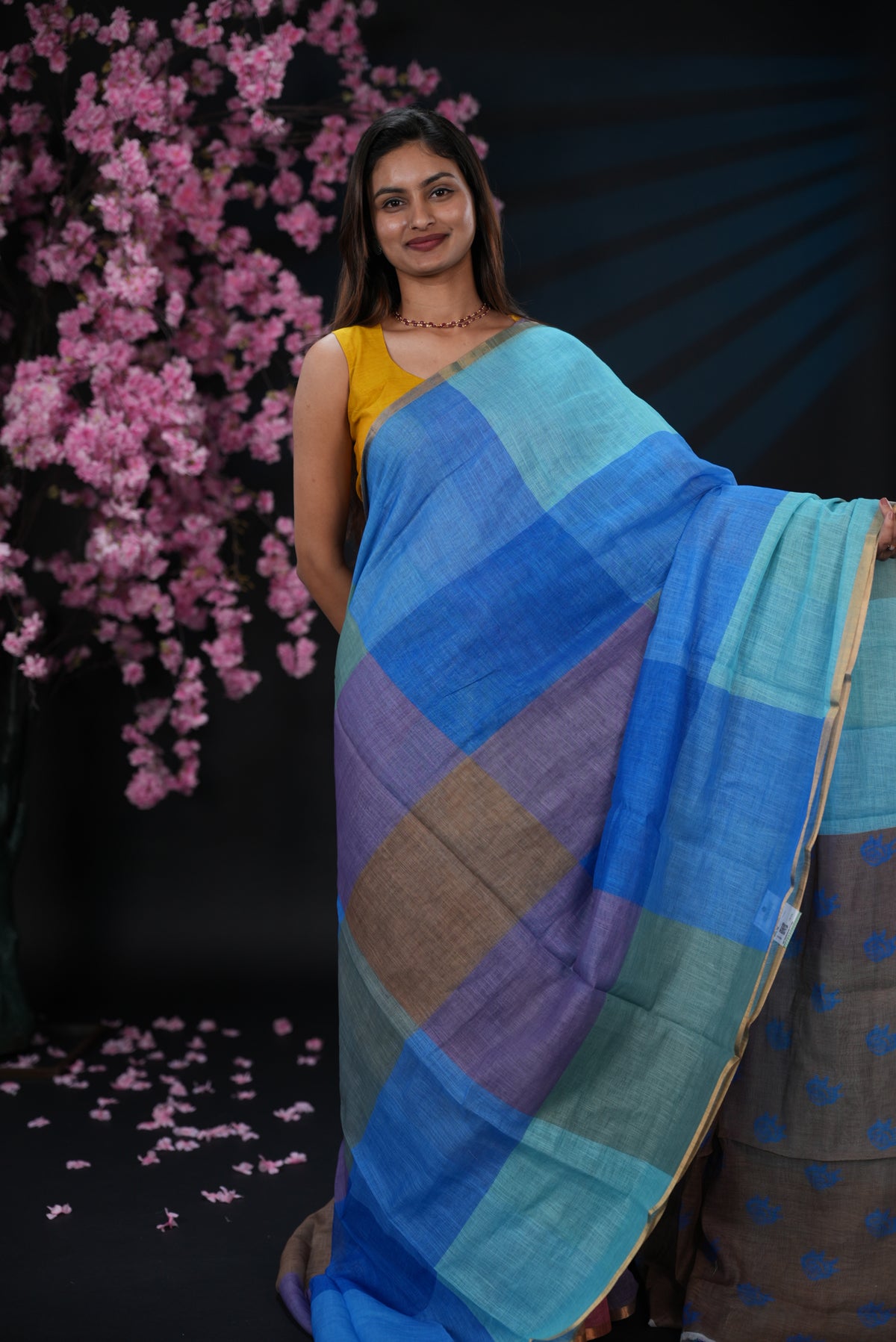 Blue & Purple colour Semi linen saree, Multi check design body, bavanchi border, contrast colour blouse.