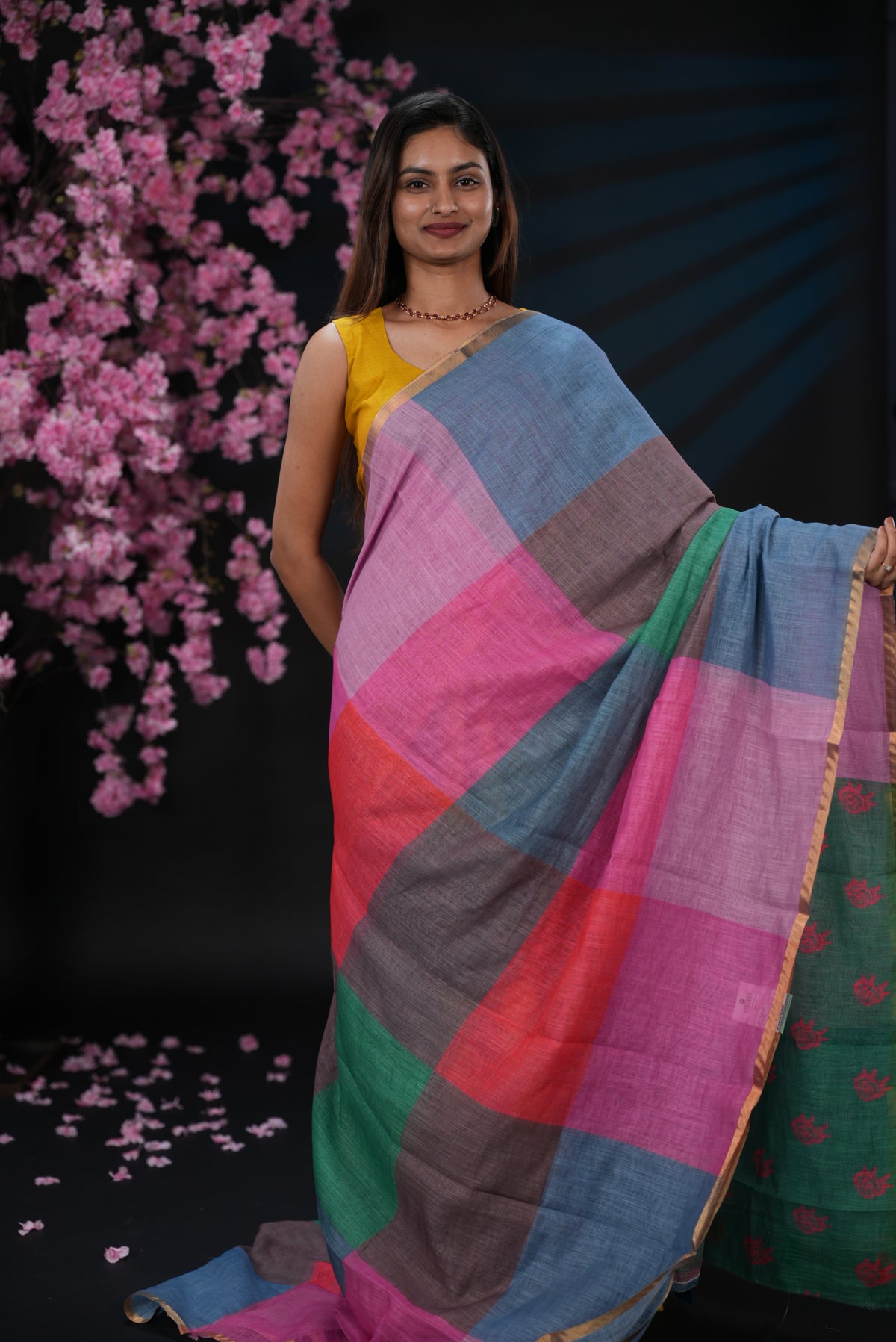 Peach & Brown colour Semi linen saree, Multi check design body, bavanchi border, contrast colour blouse.
