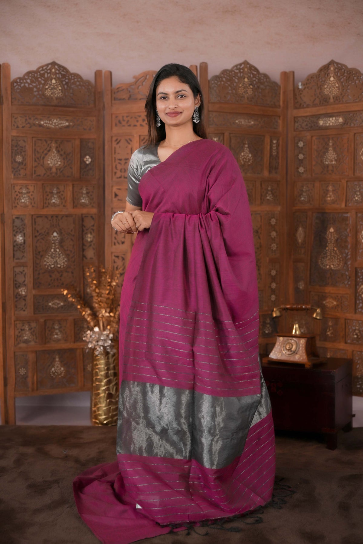 Rose  Colour Soft Cotton Saree featuring a plain body, complemented by a striped pallu with tissue detailing, paired with a matching blouse piece.