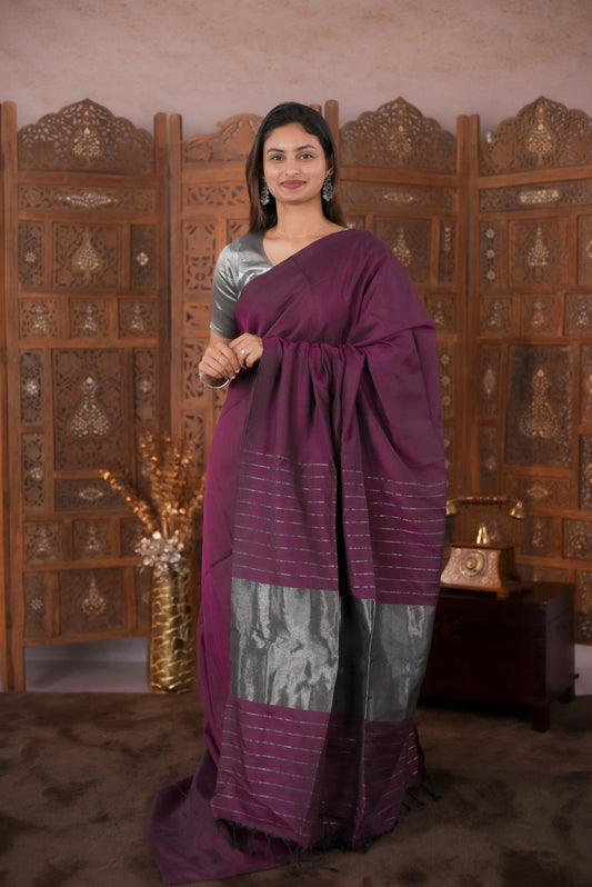 Wine Colour Soft Cotton Saree featuring a plain body, complemented by a striped pallu with tissue detailing, paired with a matching blouse piece.
