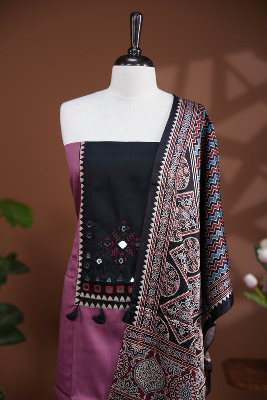 Onion Pink colour Jam Satin salwar material, Plain body with mirror & thread work on neck portion, matching bottom and Dupatta with ajrak print.