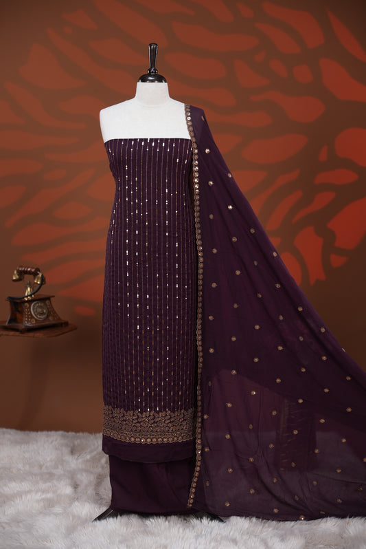 Grape colour Georgette salwar material featuring Sequins Stripes on body, paired with matching dupatta on scallop border & Santoon bottom.