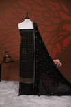 Black colour Georgette salwar material featuring Sequins Stripes on body, paired with matching dupatta on scallop border & Santoon bottom.