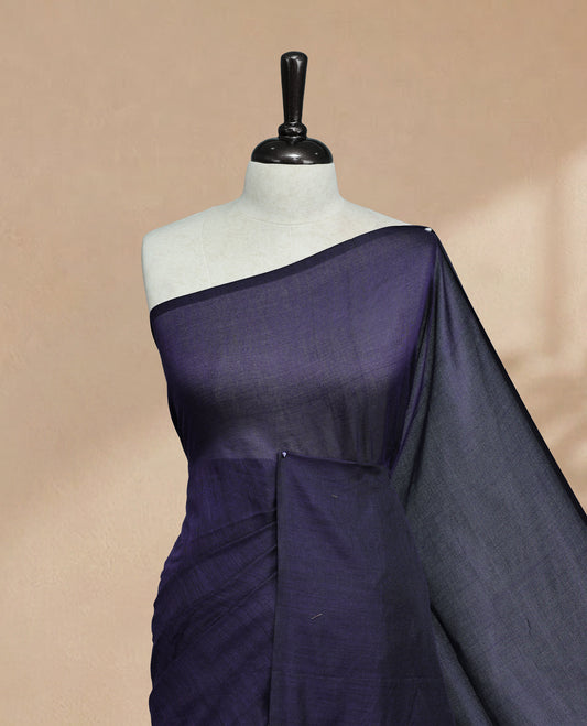Navy Blue Colour Mul Cotton saree featuring Elegant plain body, Comes with no border, finished with stylish tassels.