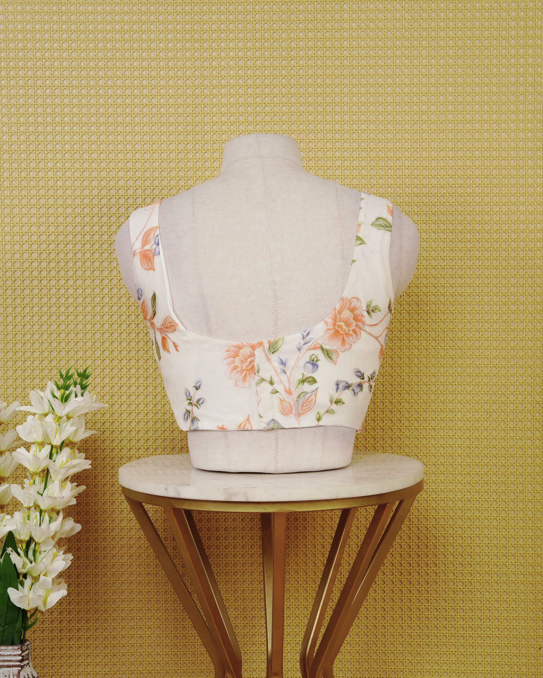 White Floral Print Sleeveless Blouse Featuring A Classic Scoop Neck, Delicate Peach Floral Print, And A Comfortable Tailored Fit.