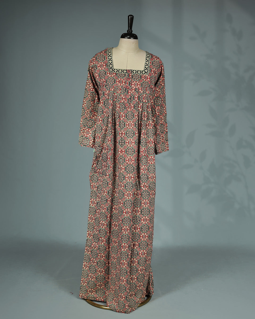 Brick Red geometric printed nighty featuring a stylish square neckline with contrast printed border, three-quarter sleeves and a relaxed full-length fit