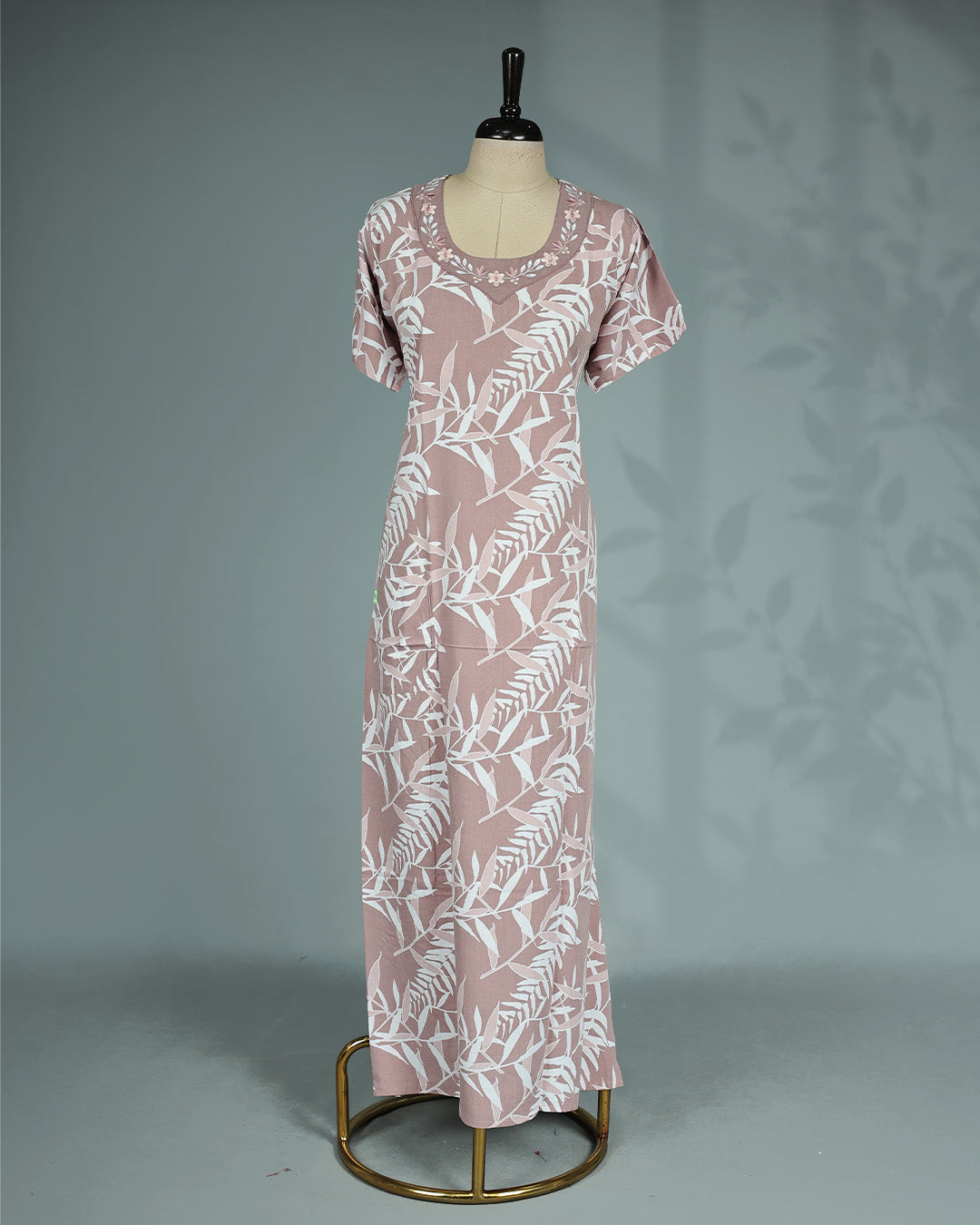 Dusty mauve pink colour nighty featuring white leaf prints on body, an embroidered round neckline and an ankle-length fit.