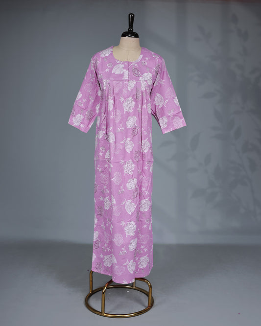 Light Purple colour nighty featuring white floral prints on body , an openable button-front round neckline, three-quarter sleeves and an ankle-length fit.