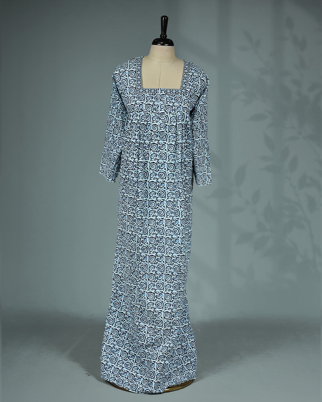 Blue and white printed nighty featuring  elegant square neckline with contrast printed border, three-quarter sleeves and a relaxed full-length fit for comfort.
