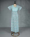 Sky blue floral kodi printed nighty with a stylish contrast asymmetrical yoke, V-neckline, short sleeves and ankle-length fit .