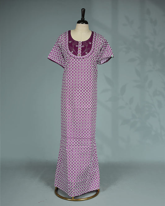 Purple and white geometric printed nighty with a classic scoop neckline, short sleeves, an embroidered contrast yoke with button detailing, and a relaxed full-length for everyday comfort and timeless style.