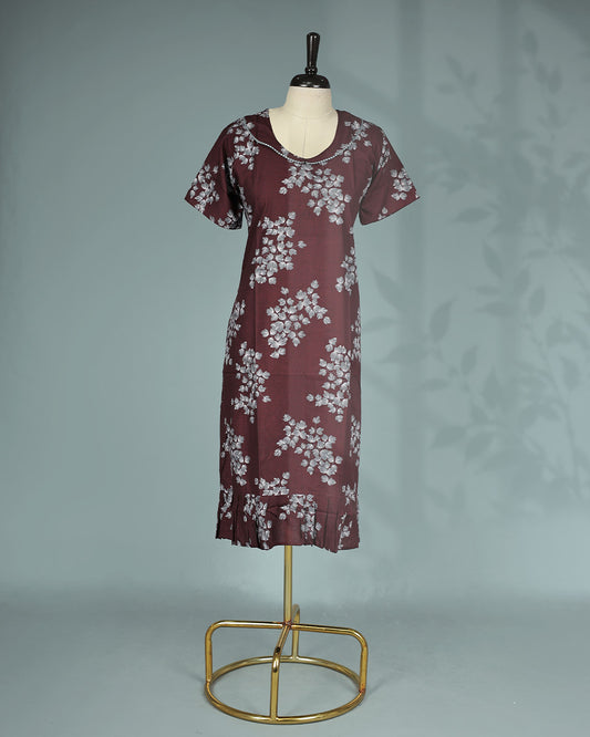 Maroon floral kodi  printed nighty with a classic scoop neckline, short sleeves, delicate lace trim detailing along the neckline, and a relaxed midi-length for everyday comfort and effortless elegance.