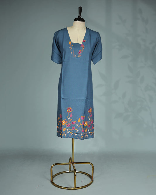 Elegant slate blue solid Short kurti featuring a stylish V-notch neckline with colourful floral embroidery, short sleeves and a comfortable Mid-length relaxed fit
