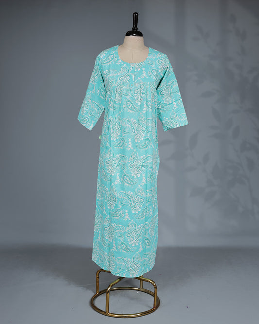 Aqua blue colour printed nighty featuring a classic round neckline With Openable Button, three-quarter sleeves and a relaxed full-length silhouette for breathable comfort and effortless everyday wear.