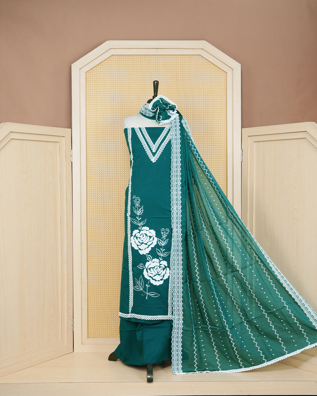 Peacock green colour Cotton Salwar Material Featuring an Threadwork on Body, lace work on neck portion, Paired With a Matching Bottom and an Elegant Dupatta.