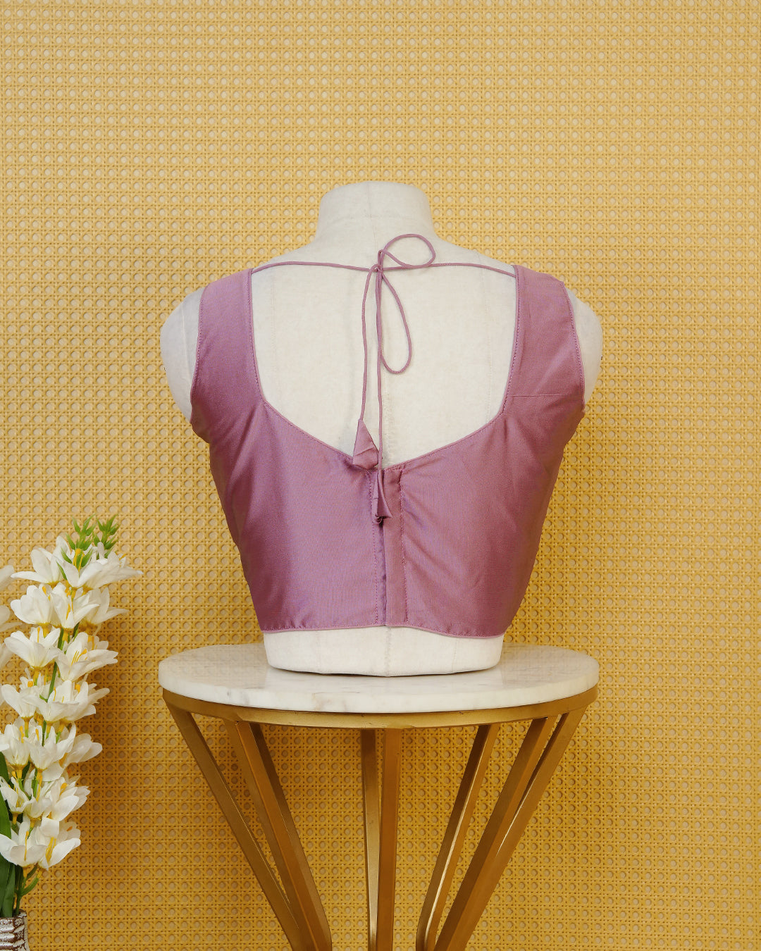 Pink colour Sleeveless Blouse Featuring A Stylish Sweetheart Neck, Smooth Finish, And A Comfortable Tailored Fit.