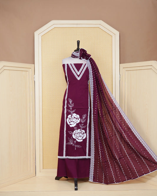 Deep Wine colour Cotton Salwar Material Featuring an Threadwork on Body, lace work on neck portion, Paired With a Matching Bottom and an Elegant Dupatta.