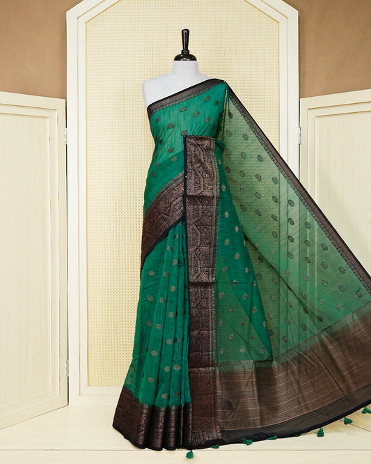 Bottle green colour semi linen saree thread motifs on body, contrast black colour gold zari border, rich pallu comes with matching blouse piece